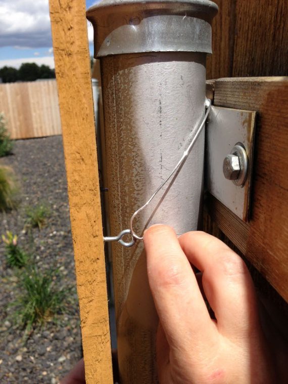 How To Cover Ugly Metal Fence Posts With Wood! • The Garden Glove