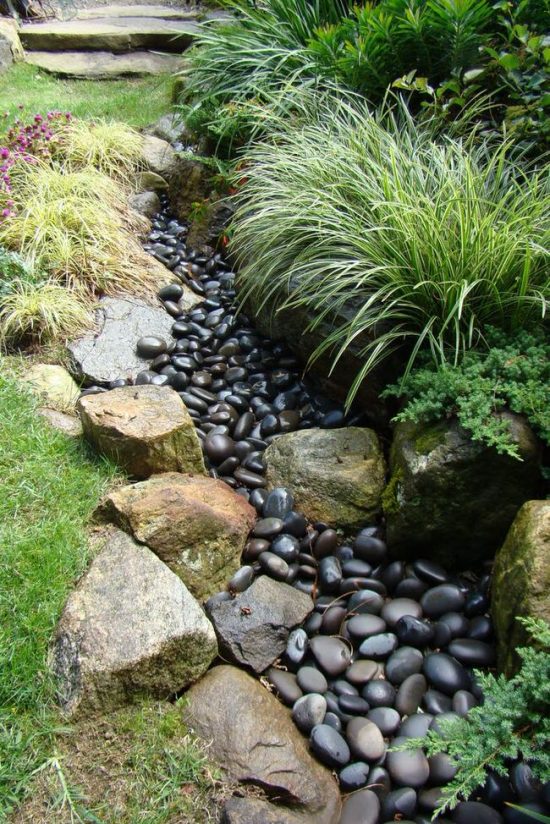 DIY Dry Creek Bed with Black Rock