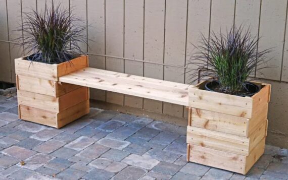 a bench with attached planter on each end