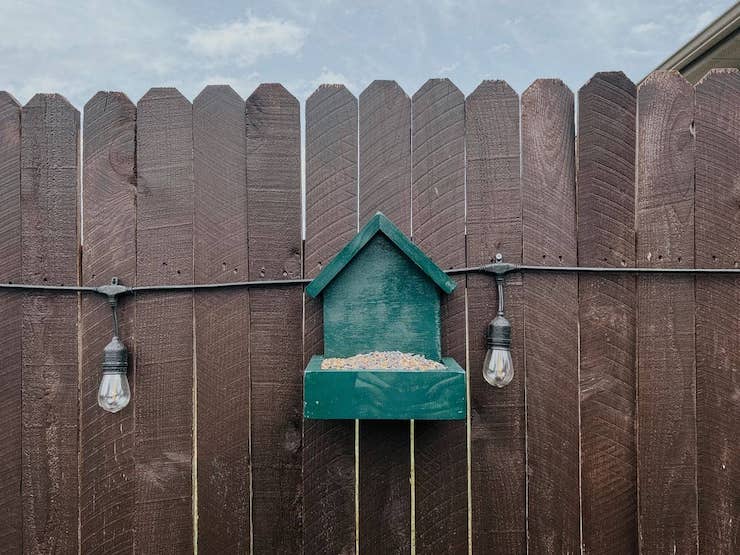 green diy bird feeder made from scrap wood